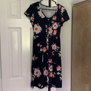 Floral dressy/casual dress for summer occasions.